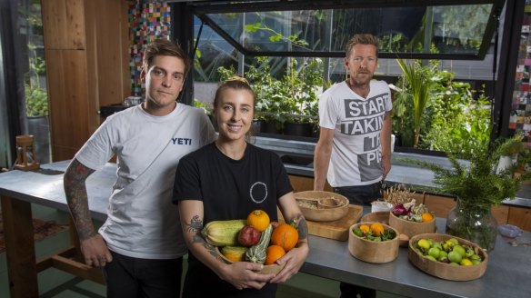 Chefs Matt Stone and Jo Barrett with Joost Bakker (right) inside the Future Food System kitchen.