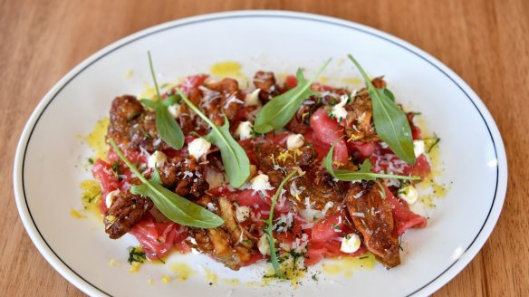 Beef carpaccio with fried jerusalem artichokes and salted ricotta.