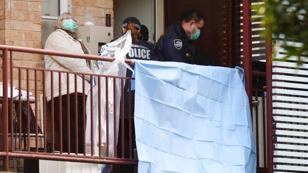Federal police carry out an anti-terror raid at a flat in Ascot Vale on Friday.