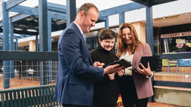 Belconnen High year 7 student, Reece Bowman, with ACT Chief Minister Andrew Barr and MLA Yvette Berry.