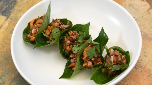 The dried prawns with ginger and toasted coconut in betel leaves served at Long Chim Thai restaurant.