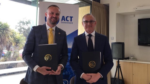 ACT Chief Minister Andrew Barr and South Australia Premier Jay Weatherill signed a memorandum of understanding between their two governments to work together to put Australian into the space race.