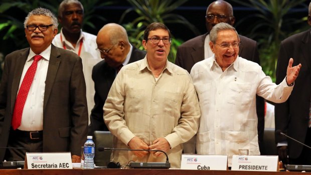 Raul Castro, right, his Foreign Minister Bruno Rodriguez, centre,  attend the 7th Summit of the Association of Caribbean States in Havana in June. 