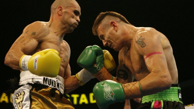 Squaring up: Green and Mundine in their 2006 showdown.