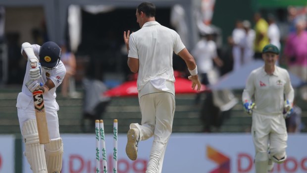 Bunny: Mitchell Starc lets Dimuth Karunaratne know he has his measure.