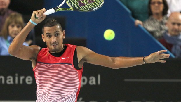Nick Kyrgios has chastised an online hater for "deluded dribbling and bad grammar."