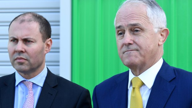 Malcolm Turnbull with Josh Frydenberg who is seeking answers over possible Hungarian citizenship.