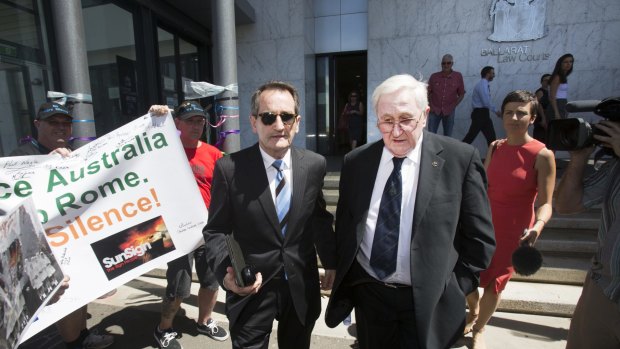 Former St Patrick's headmaster Paul Nangle, right,   leaves the Royal Commission into Institutional Responses to Child Sexual Abuse  at the Ballarat magistrates Court on Tuesday.