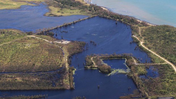 An image showing environmental damage to wetlands bordering Adani's Abbot Point coal terminal. 