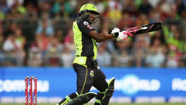 Integrity concern: Andre Russell wields his colourful bat against the Sixers at Spotless Stadium.