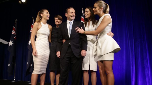 Books, clothes, anything: Op shopping is the "first port of call" for the Abbott family, pictured on election night 2013.