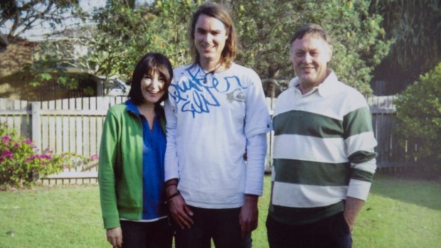 Eden Waugh with his parents Elaine and David, who were in court when their son's alleged killer pleaded not guilty.