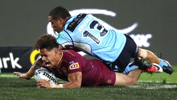 Back in it: Dane Gagai's first try gives Queensland hope.