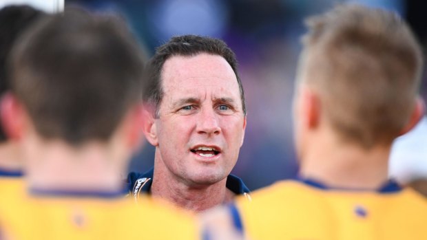 Full focus: Don Pyke addresses the Crows during the match against Fremantle.