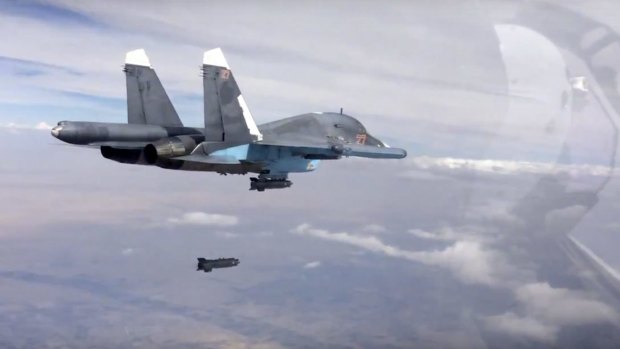A bomb is released from Russian Su-34 strike fighter in Syria in November.