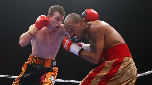 Attack mode: Jeff Horn and Randall Bailey exchange punches during the welterweight bout in Brisbane.
