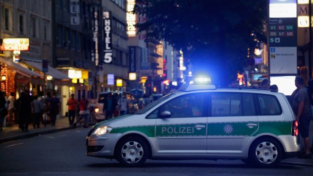 The Schillerstrasse street near Central train station is blocked by police in Munich after several people were killed by a lone shooter.