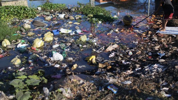 A polluted canal in the Mare favela which feeds into Guanabara Bay. 