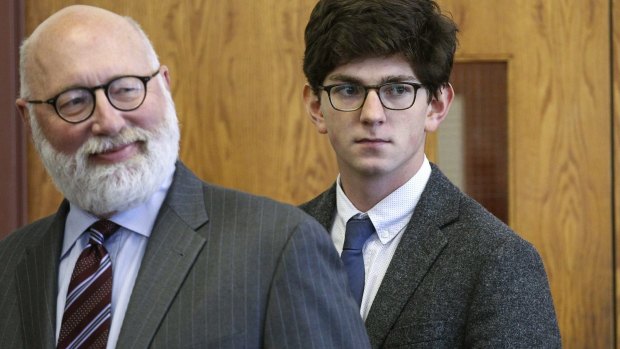 Looking in the direction of the victim's family, former St. Paul's School student Owen Labrie, right, enters the courtroom with his defence attorney J.W. Carney.