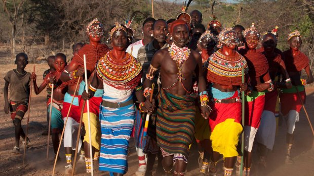 Tradition remains strong in Kenya where Samburu Morani (warriors) and girls dance at a wedding ceremony.