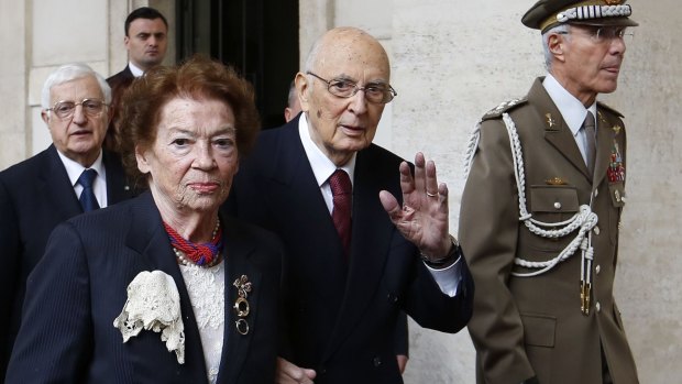 Italian President Giorgio Napolitano with his wife Clio as they  leave the Quirinale presidential palace in Rome on Wednesday.
