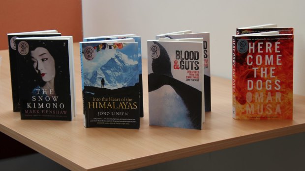 The four books shortlisted for the 2015 ACT Book of the Year - Mark Henshaw's <i>The Snow Kimono</i>, Jono Lineen's <i>Into the Heart of the Himalayas</i>, Omar Musa's <i>Here Come the Dogs</i>, and Sam Vincent's <i>Blood and Guts</i>.