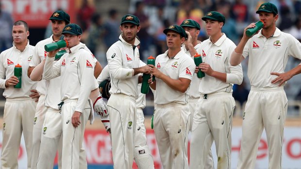 Frustration: Australian players watch another failed review.