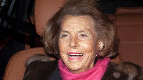 Liliane Bettencourt is seen as she leaves Armani' spring/summer fashion collection, in Paris, 2011. 