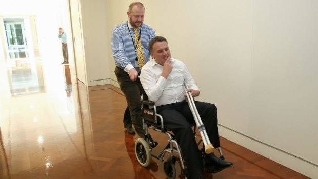 Mr Briggs, pictured the day after Tony Abbott lost the prime ministership, injured his knee at a party hosted by the former leader on the night he was dumped as PM.