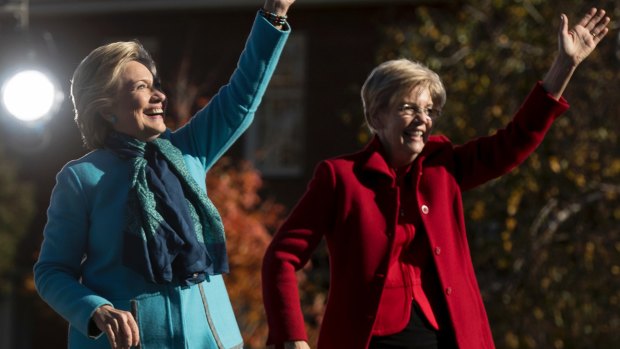 Early advantage: Democratic presidential candidate Hillary Clinton (L) at a rally in New Hampshire with Senator Elizabeth Warren.