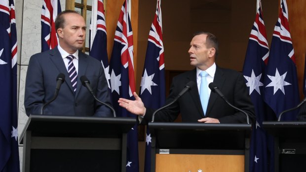 Immigration Minister Peter Dutton and Prime Minister Tony Abbott address the media on Tuesday.