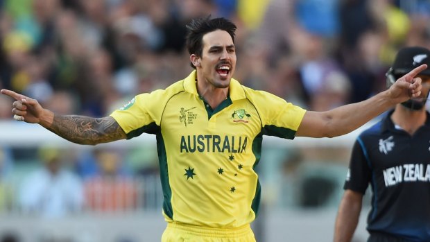 Australia's Mitchell Johnson celebrates the dismissal of New Zealand's Daniel Vettori during the World Cup final at the MCG on Sunday. 
