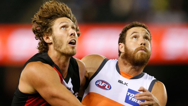 In the land of the Giants: Shane Mumford, right, during the match against St Kilda.