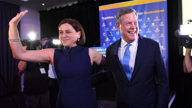 Queensland Opposition Leader Tim Nicholls with deputy opposition leader Deb Frecklington (left) after speaking at the LNP Election function during the night of the 2017 Queensland Election, in Brisbane, Saturday, November 25, 2017. Nicholls joined LNP supporters to watch the election results. (AAP Image/Tracey Nearmy) NO ARCHIVING