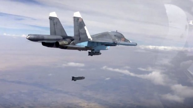 A bomb is released from Russian Su-34 strike fighter in Syria in November.