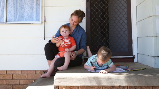 Single mother Jessica Russell with her two sons Ryan, almost three, and Andrew, one, at their home in St Clair.