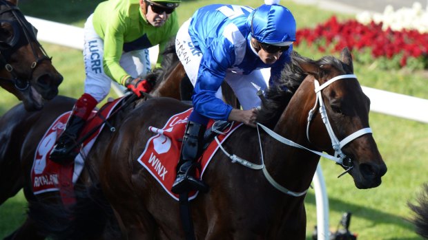 Unbackable: Winx wins her third consecutive Cox Plate at Mooney Valley.