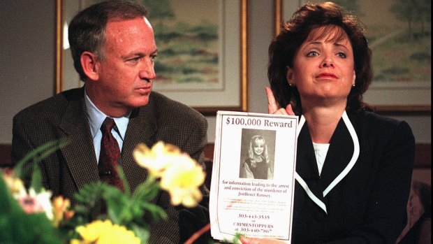 John Ramsey looks on as his wife, Patsy, as they appeal for more information about the death of JonBenet Ramsay in 1997.