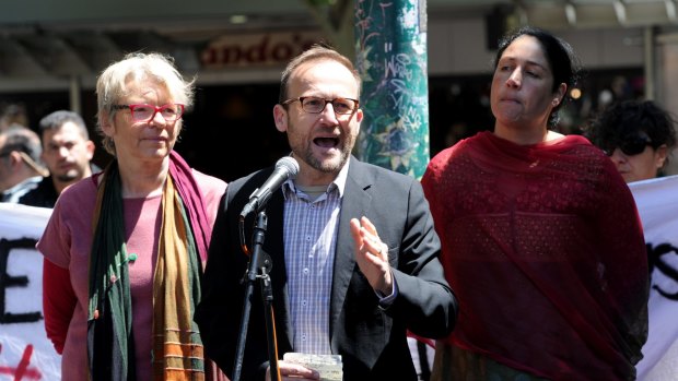 Greens MP Adam Bandt addresses protesters at a rally in Melbourne on Saturday.