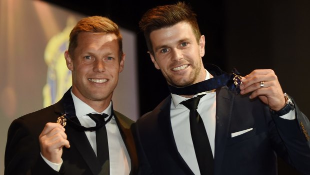 The new medallists: Sam Mitchell and Trent Cotchin.
