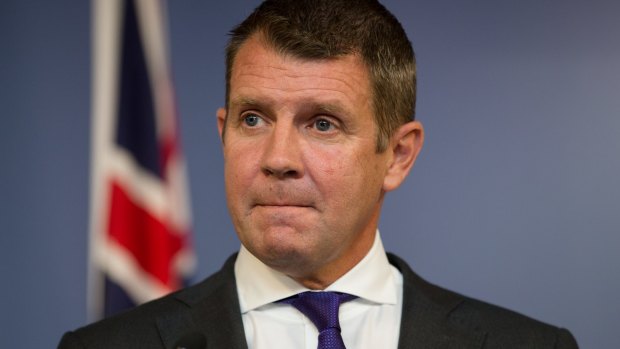 Premier Mike Baird is emotional at a press conference announcing his resignation.