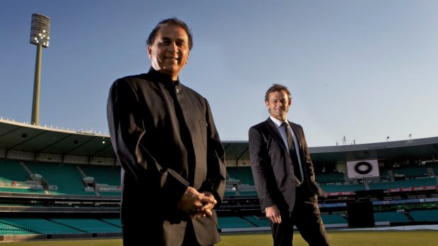 Indian batting great Sunil Gavaskar (left), pictured with Adam Gilchrist in 2010, has joined the commentary box.