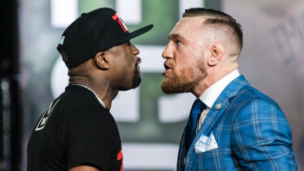 Floyd Mayweather and Conor McGregor face off on a promotional stop in Toronto on July 12 ahead of their Las Vegas bout.