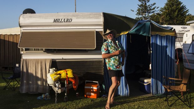 Tim Bennett  outside his family camper van at Two Shores Holiday Village at The Entrance.