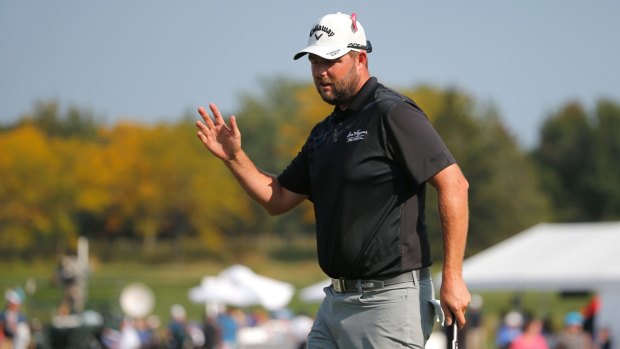 Many thanks: Marc Leishman acknowledges the crowd after making birdie on the 13th hole on Saturday.