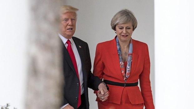 Theresa May has spoken out about that hand holding moment in American Vogue.