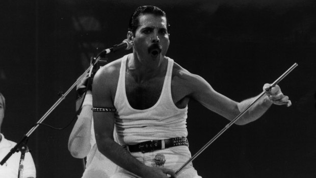 The late, great Freddy Mercury fronts  Queen at Wembly Stadium in 1985. The band sold  6.1 million copies of their Greatest Hits album. 