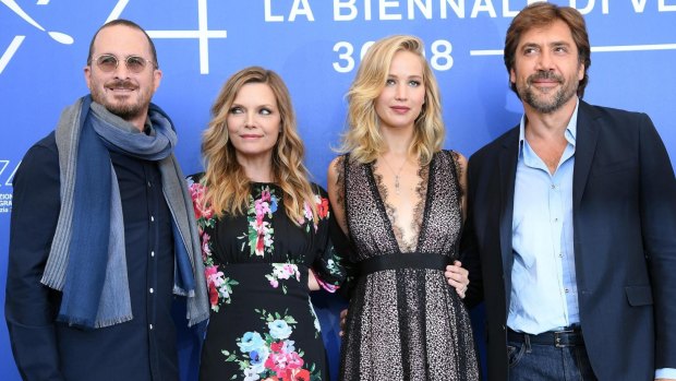 From left, US film director Darren Aronofsky, actresses Michelle Pfeiffer, Jennifer Lawrence and Spanish actor Javier Barden pose during a photocall for the movie 'Mother!'.