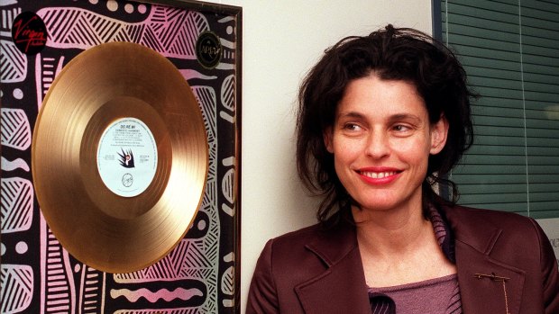 Deborah Conway with a gold record in 2001. 