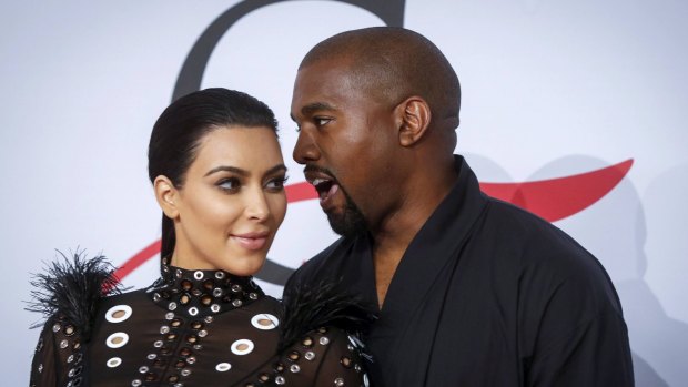 Kanye West, pictured with wife Kim Kardashian, signed Hudson Mohawke to his label, GOOD Music.